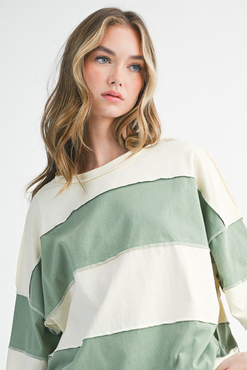 Butter Green oversized color block pullover on model